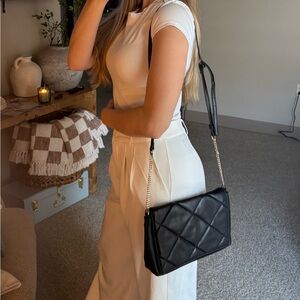 a new day Black Crossbody Bag